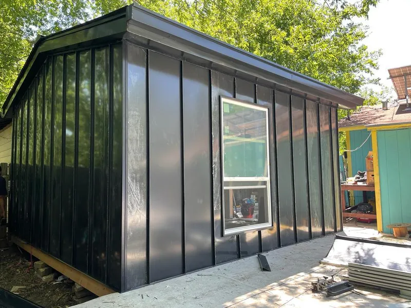 Black standing seam metal wall panels for Metal Roof Installation in Clarcona